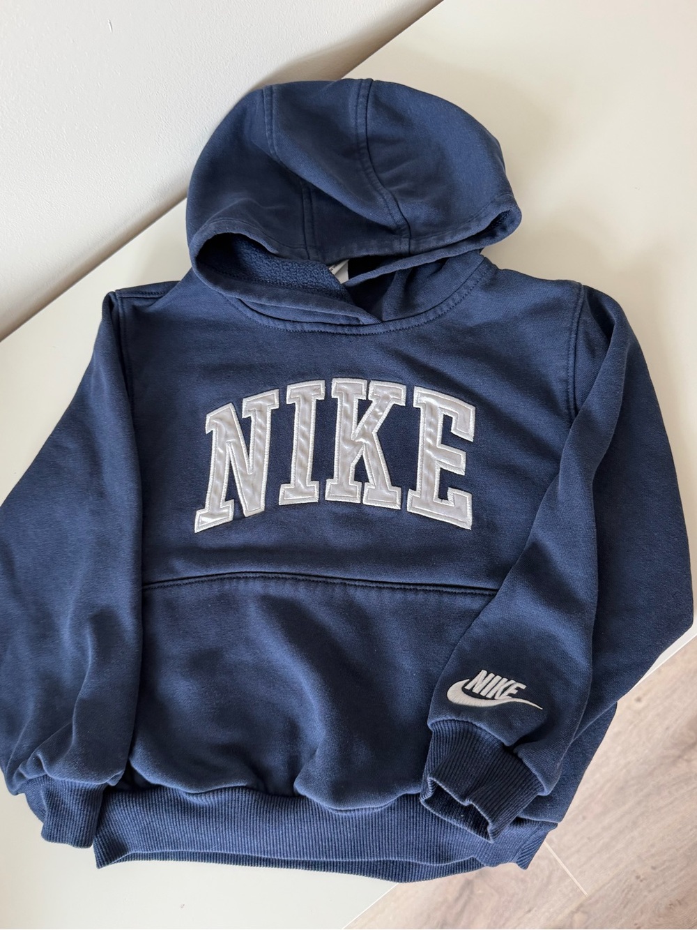 Nike Dark Blue Hoodie with White Appliqué Logo